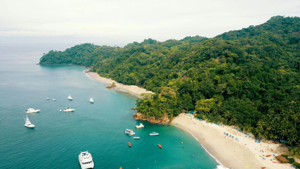 bird s eye view photography of mountain near body of water