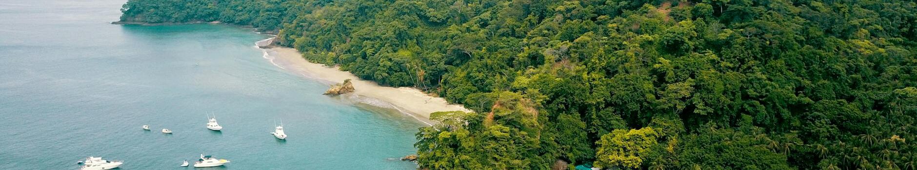 bird s eye view photography of mountain near body of water