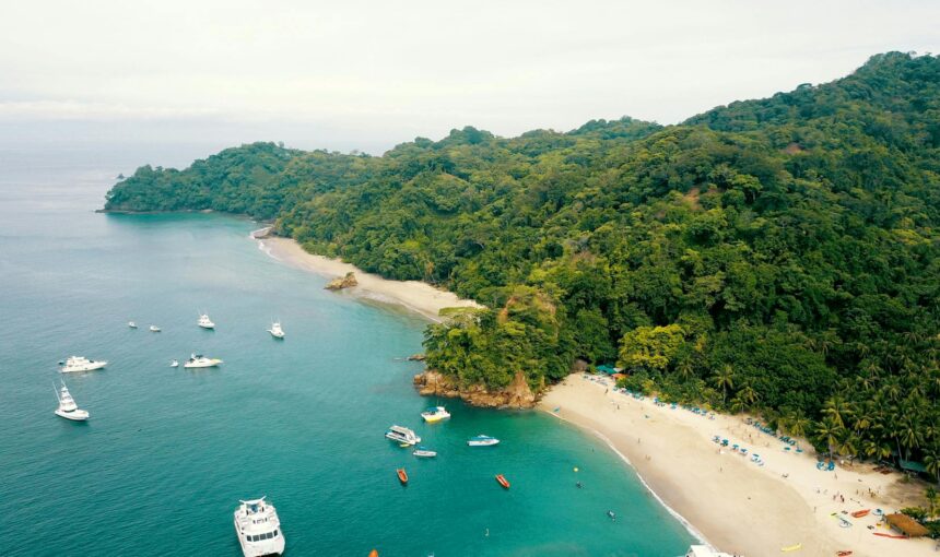 bird s eye view photography of mountain near body of water